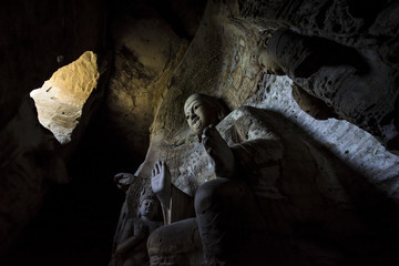 Buddha statue at Yungang Grottoes in Datong, China