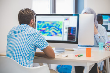 Casually Dressed Man Working In Design Studio