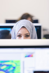 Young Arabic business woman wearing hijab,working in her startup