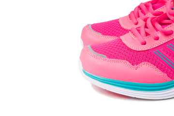 Pink sport shoes on white background
