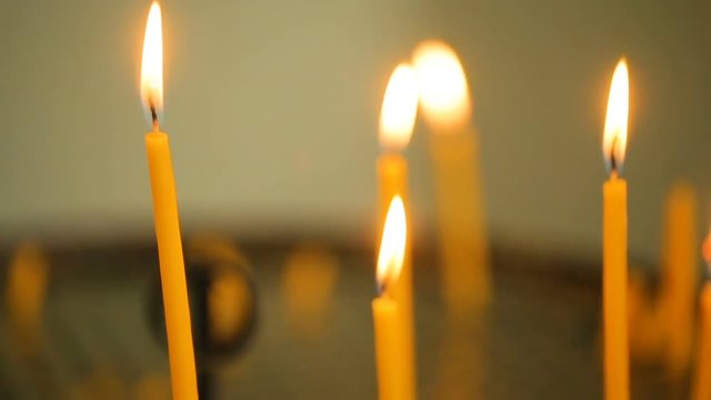 Candles flaming in candlestick