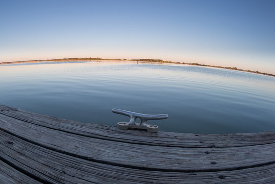 Calm Large Lake During Sunrise, from dock