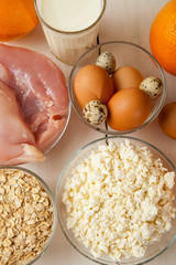 Chicken fillet, cottage cheese, eggs, yogurt, oranges and oat flakes