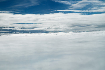 Obraz premium White clouds, view from above airplane