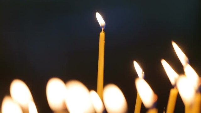 Candles flaming in candlestick