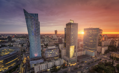 Warsaw Downtown, Poland. Sunset behind the building with lens flare © marchello74