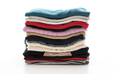 stacks of clothing on white