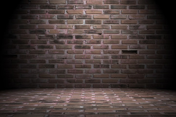 White spotlight brick wall background.