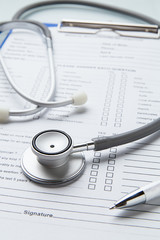 Stethoscope pen notes data on medical document