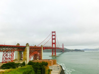 The gold gate bridge in a fog in San Francisco