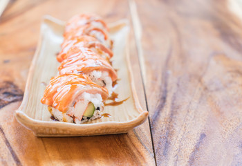 salmon burned maki with teriyaki sauce