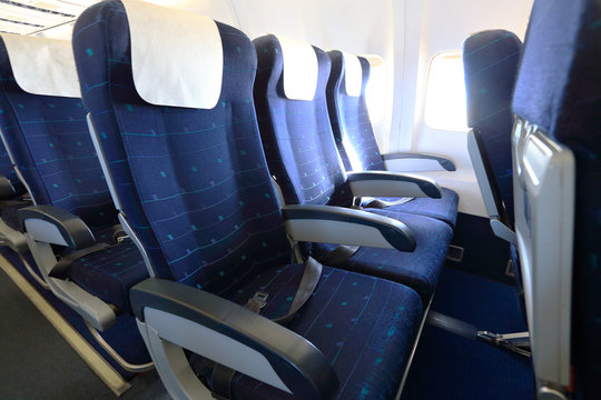 Blue empty aircraft seats
