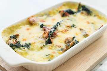 spinach lasagna in white plate