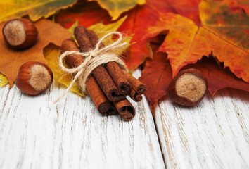 Autumn leaves with cinnamon and hazelnuts