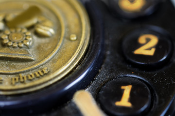 detail of an antique phone