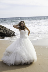 Fototapeta na wymiar Bride on beach