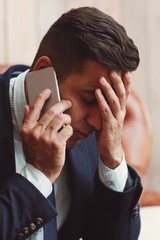 Man receiving bad news on the phone. Family problems, relationship concept.