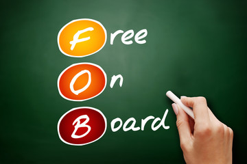 Hand drawn FOB - Free On Board, acronym business concept on blackboard