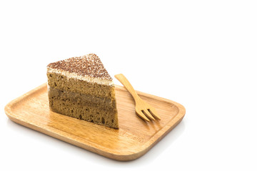 Coffee cake slice in wooden plate.