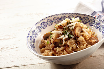 Rice with mushrooms and herbs in bowl