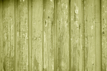 Yellow painted wood planks as background or texture. Close-up