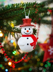 Christmas decoration snowman on the tree