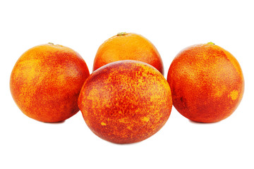 Ripe red blood oranges isolated on white background. Closeup.