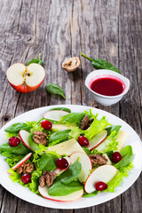apple, spinach, cheese, lettuce leaves Frise, caramelized walnut
