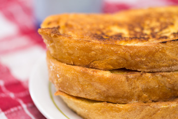 French toast with glass of yogurt on the table