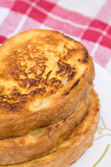 French toast with glass of yogurt on the table