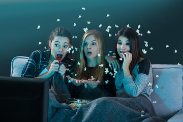 Fototapeta premium Scared teenage watching movies