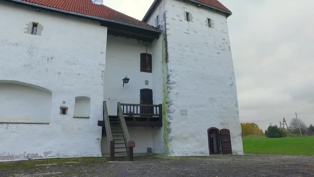 Low angle steadicam shot of Purtse Castle in Purtse, Estonia. Local landmark and popular touristic destination.
