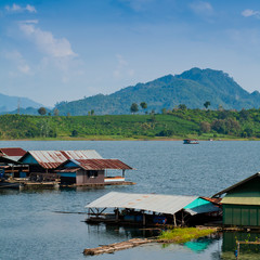 Fototapeta na wymiar raft on river and mountain at Sangklaburi in Thailand