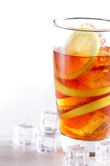 fresh ice lemon tea with lemon slice and ice cubes