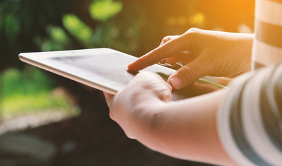 woman hands holding tablet.Social media concept.