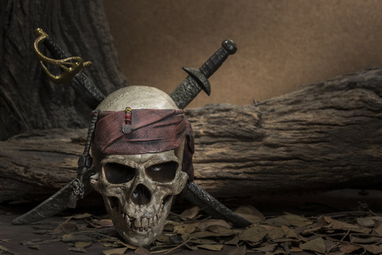 Pirate skull with two swords
