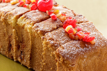 fresh homemade soft sponge cake with minced cherry topping