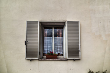 ustic wall with open window