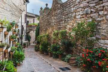 Surprising appearance of streets full of flowers in Spello, Umbr
