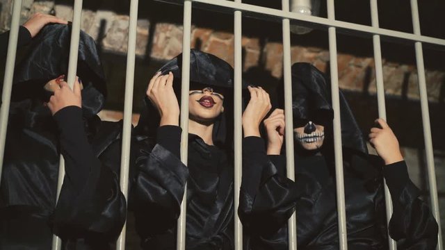 Three female vampires posing and flirting in the lattices in 4K