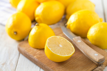 lemons on wooden surface