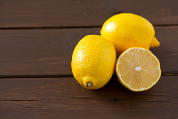 lemons on wooden surface