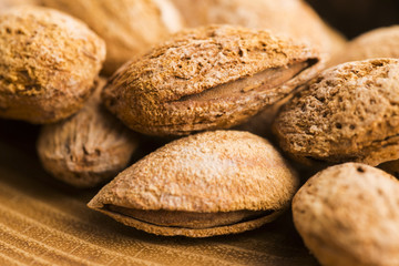 Heap of almond nuts in shell