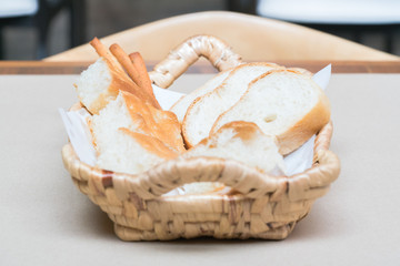 Fresh bread in the basket. Food background.
