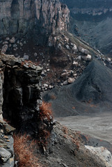 Black volcanic mountains and cliff faces