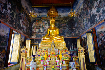 Beautiful of golden Buddha statue and thai art architecture in Wat Bovoranives, Bangkok, Thailand.