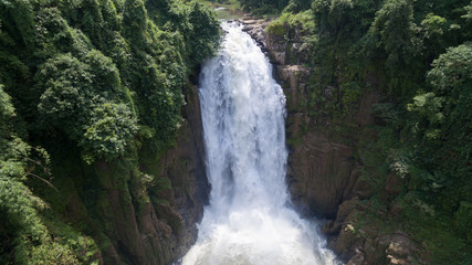Landscape of Very high Waterfall from cliff in forest, Thailand