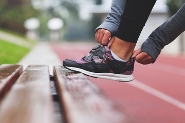 Close-up of running shoe, getting ready for jogging