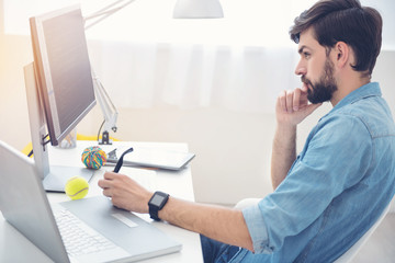 Hardworking programmer concentrating on his work