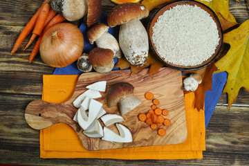 Ingredients for risotto with wild mushrooms boletus